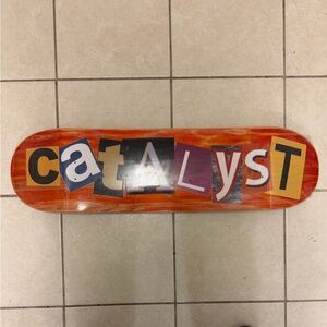 Catalyst Orange Skateboard Deck with Bold Letters